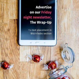 Phone with words on it saying Advertise in our Friday night newsletter The Wrap-Up